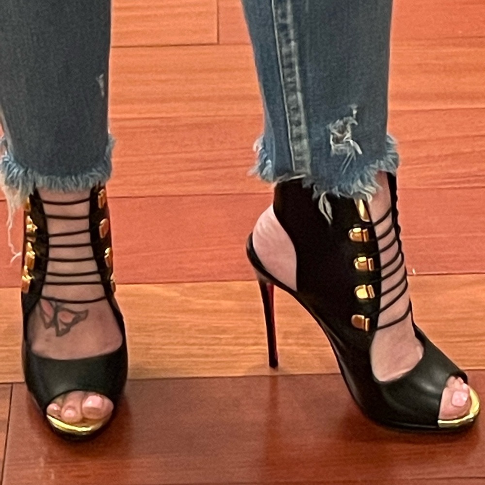 Christian Louboutin black open bootie.